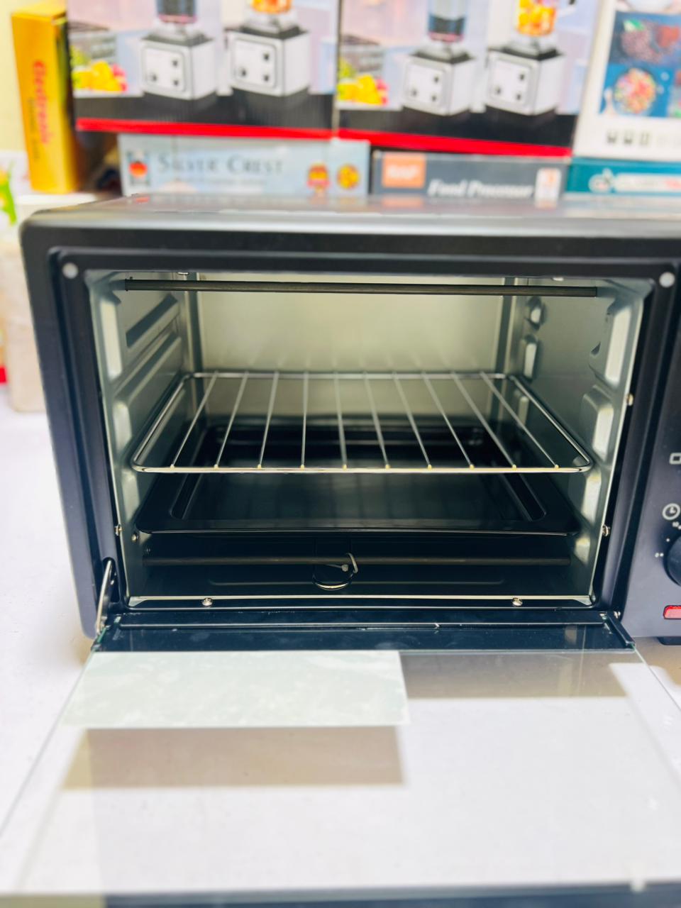 Kenwood 25L Electric Baking Oven  toaster  With Double Tray & Rotisserie Grill  ,  1300 Watt