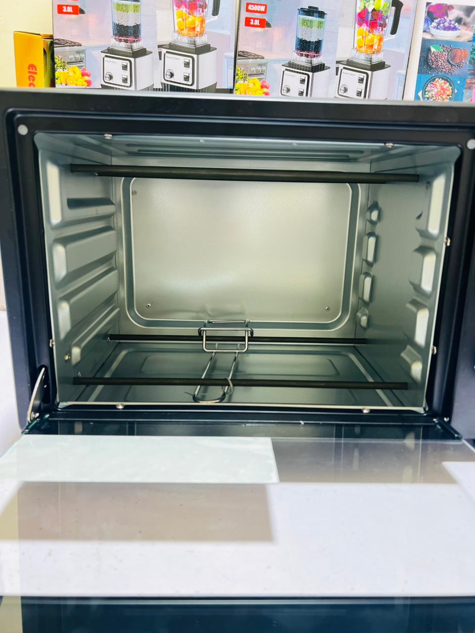 Kenwood 25L Electric Baking Oven  toaster  With Double Tray & Rotisserie Grill  ,  1300 Watt